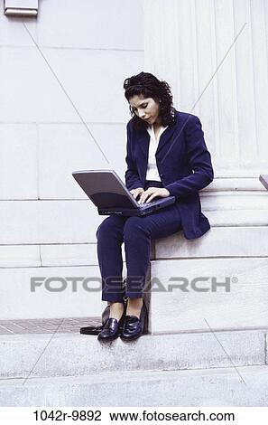 woman, Hispanic, computer, laptop, typing, business, outdoors View Large Photo Image Stock Image - woman, Hispanic, computer, laptop, typing, business, outdoors. Fotosearch