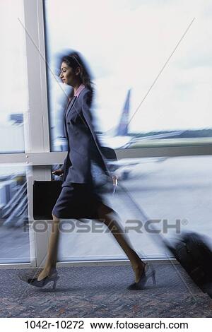 woman, luggage, business, indoors, airport, Caucasian, businesswoman View Large Photo Image Stock Image - woman, luggage, business, indoors, airport, Caucasian, businesswoman. Fotosearch