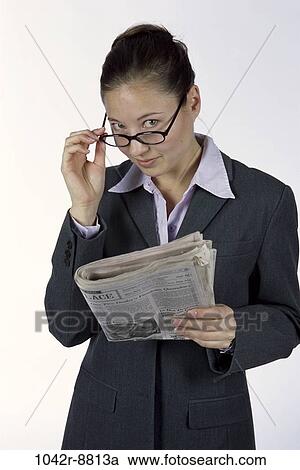 woman, newspaper, eyeglasses, Hispanic, reading, business, indoors View Large Photo Image Stock Image - woman, newspaper, eyeglasses, Hispanic, reading, business, indoors. Fotosearch