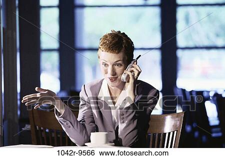 woman, talking, coffee, phone, business, Middle-aged, restaurant View Large Photo Image Stock Photograph - woman, talking, coffee, phone, business, Middle-aged, restaurant. Fotosearch