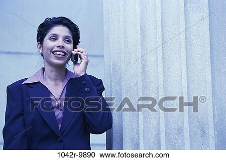 woman, talking, Hispanic, column, phone, business, outdoors View Large Photo Image Stock Image - woman, talking, Hispanic, column, phone, business, outdoors. Fotosearch