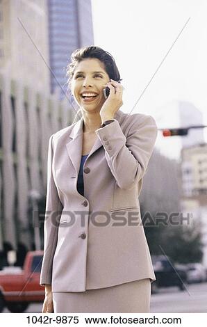 woman, talking, Hispanic, phone, business, outdoors, cell phone View Large Photo Image Stock Photography - woman, talking, Hispanic, phone, business, outdoors, cell phone. Fotosearch