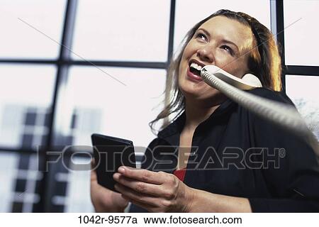 woman, telephone, computer, phone, laughing, planning, using View Large Photo Image Stock Image - woman, telephone, computer, phone, laughing, planning, using. Fotosearch