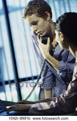 women, desk, telephone, talking, phone, business, indoors View Large Photo Image Stock Image - women, desk, telephone, talking, phone, business, indoors. Fotosearch