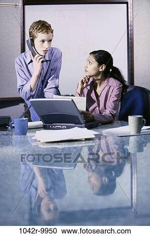 women, talking, computer, laptop, phone, business, serious View Large Photo Image Stock Image - women, talking, computer, laptop, phone, business, serious. Fotosearch