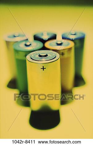 Stock Image - yellow, still life, power, positive, batteries, Hardware still lifes. Fotosearch
