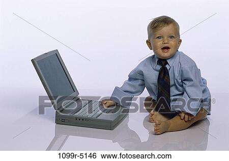 Stock Photograph - baby, computer, laptop, business, future, using, metaphor. Fotosearch