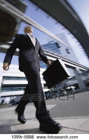 blur, walking, briefcase, senior, motion, business View Large Photo Image Stock Photo - blur, walking, briefcase, senior, motion, business. Fotosearch