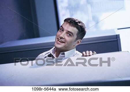 Stock Image - business, businessman, indoors, cubby, young adult, Businessmen individuals. Fotosearch