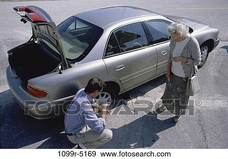 car, problem, transportation, tire, flat, repair, help View Large Photo Image Stock Photo - car, problem, transportation, tire, flat, repair, help. Fotosearch