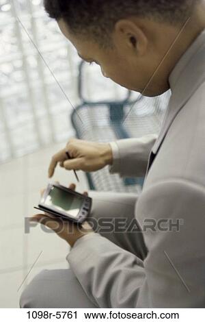 computer, business, using, businessman, indoors, African-American View Large Photo Image Stock Image - computer, business, using, businessman, indoors, African-American. Fotosearch