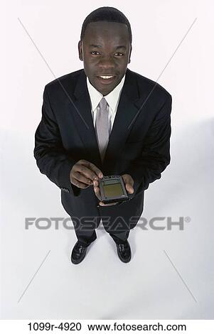 computer, business, using, businessman, indoors, African-American View Large Photo Image Stock Image - computer, business, using, businessman, indoors, African-American. Fotosearch