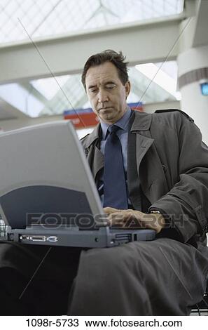 computer, laptop, business, Middle-aged, using, businessman View Large Photo Image Stock Image - computer, laptop, business, Middle-aged, using, businessman. Fotosearch