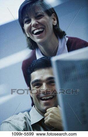 computer, laughing, business, Middle-aged, joyous, using, casual View Large Photo Image Stock Photo - computer, laughing, business, Middle-aged, joyous, using, casual. Fotosearch