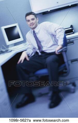 Stock Image - desk, computer, business, businessman, indoors, Caucasian. Fotosearch