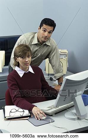 desk, computer, business, Middle-aged, using, bewildered, casual View Large Photo Image Stock Image - desk, computer, business, Middle-aged, using, bewildered, casual. Fotosearch