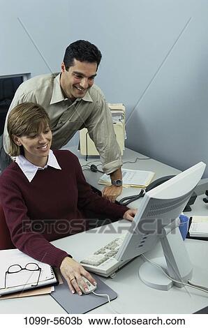 desk, computer, business, Middle-aged, using, casual, Caucasian View Large Photo Image Stock Image - desk, computer, business, Middle-aged, using, casual, Caucasian. Fotosearch