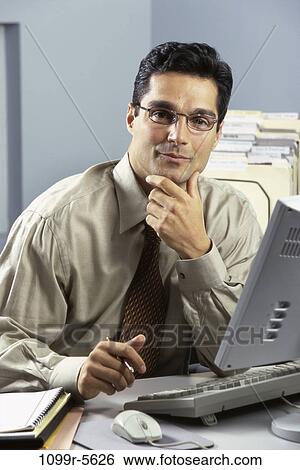 desk, computer, business, Middle-aged, businessman, indoors View Large Photo Image Stock Photograph - desk, computer, business, Middle-aged, businessman, indoors. Fotosearch