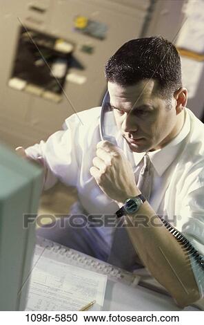desk, computer, phone, business, serious, using View Large Photo Image Stock Image - desk, computer, phone, business, serious, using. Fotosearch