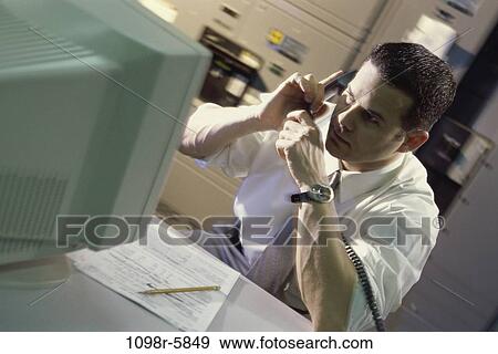 desk, computer, phone, business, using, businessman View Large Photo Image Stock Photo - desk, computer, phone, business, using, businessman. Fotosearch