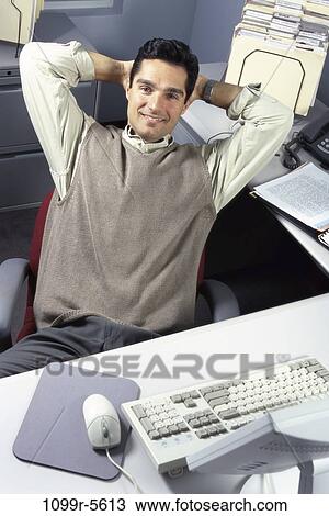 desk, Hispanic, business, relaxing, casual, businessman View Large Photo Image Stock Image - desk, Hispanic, business, relaxing, casual, businessman. Fotosearch