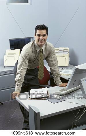 desk, Hispanic, computer, business, businessman, indoors View Large Photo Image Stock Photo - desk, Hispanic, computer, business, businessman, indoors. Fotosearch
