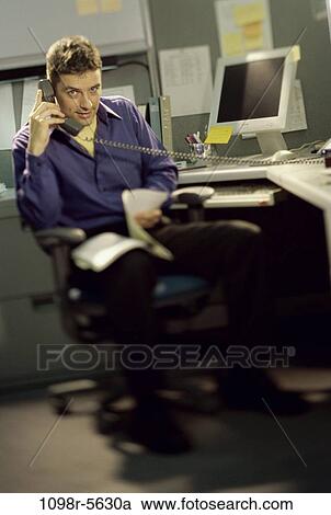 Stock Image - desk, telephone, talking, computer, phone, business. Fotosearch