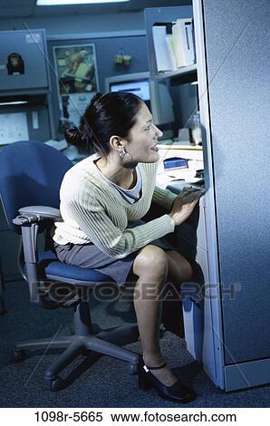desk, woman, Hispanic, business, curious, casual, indoors View Large Photo Image Stock Photography - desk, woman, Hispanic, business, curious, casual, indoors. Fotosearch