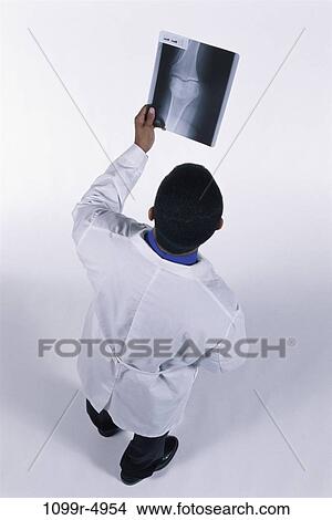 doctor, medicine, medical, indoors, examining, medical imaging View Large Photo Image Picture - doctor, medicine, medical, indoors, examining, medical imaging. Fotosearch