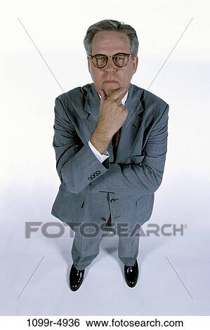 eyeglasses, business, Middle-aged, contemplation, planning, serious View Large Photo Image Stock Photograph - eyeglasses, business, Middle-aged, contemplation, planning, serious. Fotosearch