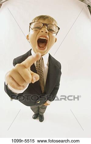 Stock Photography - finger, people, shouting, suit, eyeglasses, boy, pointing. Fotosearch