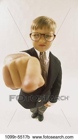 Stock Image - finger, people, suit, eyeglasses, boy, pointing, business. Fotosearch