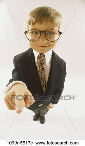 Stock Image - finger, people, suit, eyeglasses, boy, pointing, business. Fotosearch