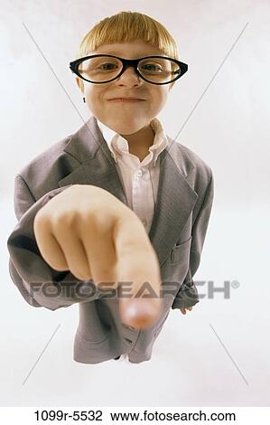 Stock Image - finger, people, suit, eyeglasses, girl, pointing, business. Fotosearch