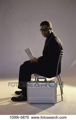 glasses, newspaper, briefcase, business, businessman, indoors View Large Photo Image Stock Image - glasses, newspaper, briefcase, business, businessman, indoors. Fotosearch