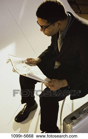 glasses, newspaper, reading, business, businessman, indoors View Large Photo Image Stock Photo - glasses, newspaper, reading, business, businessman, indoors. Fotosearch