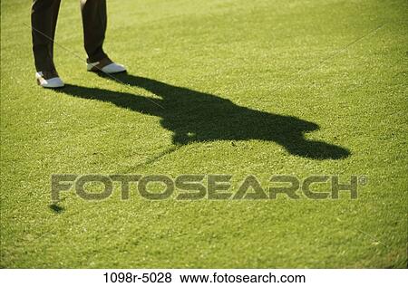 grass, golf, swing, silhouette, sports, background View Large Photo Image Stock Photo - grass, golf, swing, silhouette, sports, background. Fotosearch