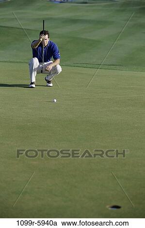 Stock Image - green, playing, golf, ball, outdoors, challenges. Fotosearch