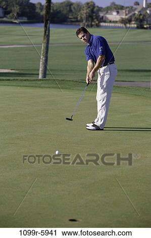 Stock Image - green, playing, golf, ball, outdoors, challenges. Fotosearch