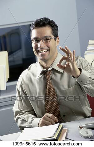 hand, desk, eyeglasses, Hispanic, business, gesture View Large Photo Image Stock Photography - hand, desk, eyeglasses, Hispanic, business, gesture. Fotosearch