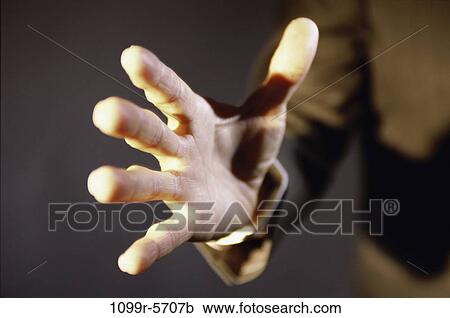 Stock Image - hand, Hispanic, business, anticipation, gesture. Fotosearch