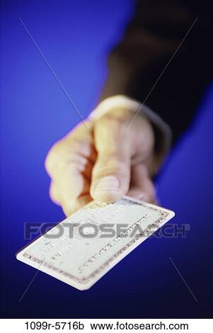 Stock Image - hand, shopping, indulgence, credit card, buying, purchasing, Financial various. Fotosearch