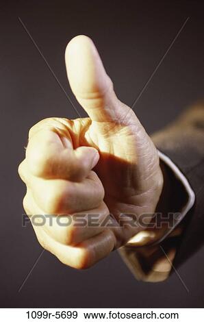 Stock Photo - hand, thumb, achievement, approval, Business hand gestures. Fotosearch