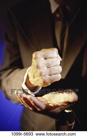 hands, business, fist, businessman, indoors, adamant View Large Photo Image Stock Image - hands, business, fist, businessman, indoors, adamant. Fotosearch