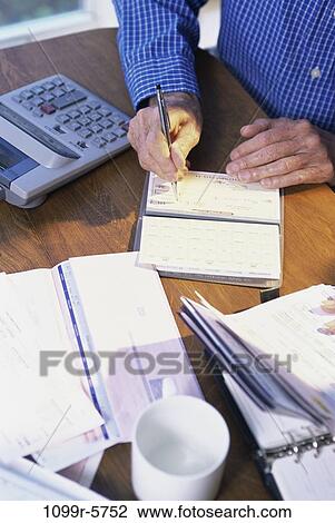 hands, calculator, writing, finance, bills, personal finance, check View Large Photo Image Stock Image - hands, calculator, writing, finance, bills, personal finance, check. Fotosearch