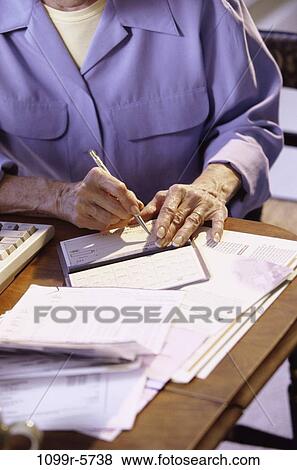 hands, pen, senior, writing, finance, bills, personal finance View Large Photo Image Stock Photo - hands, pen, senior, writing, finance, bills, personal finance. Fotosearch