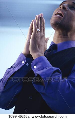 Stock Image - hands, stress, pleading, business, frustrated, pray. Fotosearch