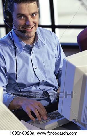headset, computer, business, using, casual, businessman View Large Photo Image Stock Image - headset, computer, business, using, casual, businessman. Fotosearch