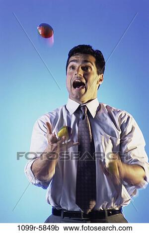 Stock Image - Hispanic, overwhelmed, business, challenges, risk, businessman. Fotosearch