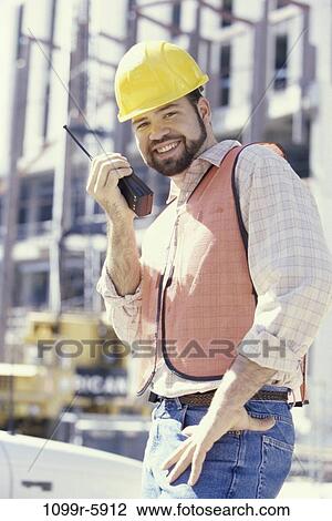 industry, construction, talking, worker, Middle-aged, using View Large Photo Image Stock Image - industry, construction, talking, worker, Middle-aged, using. Fotosearch